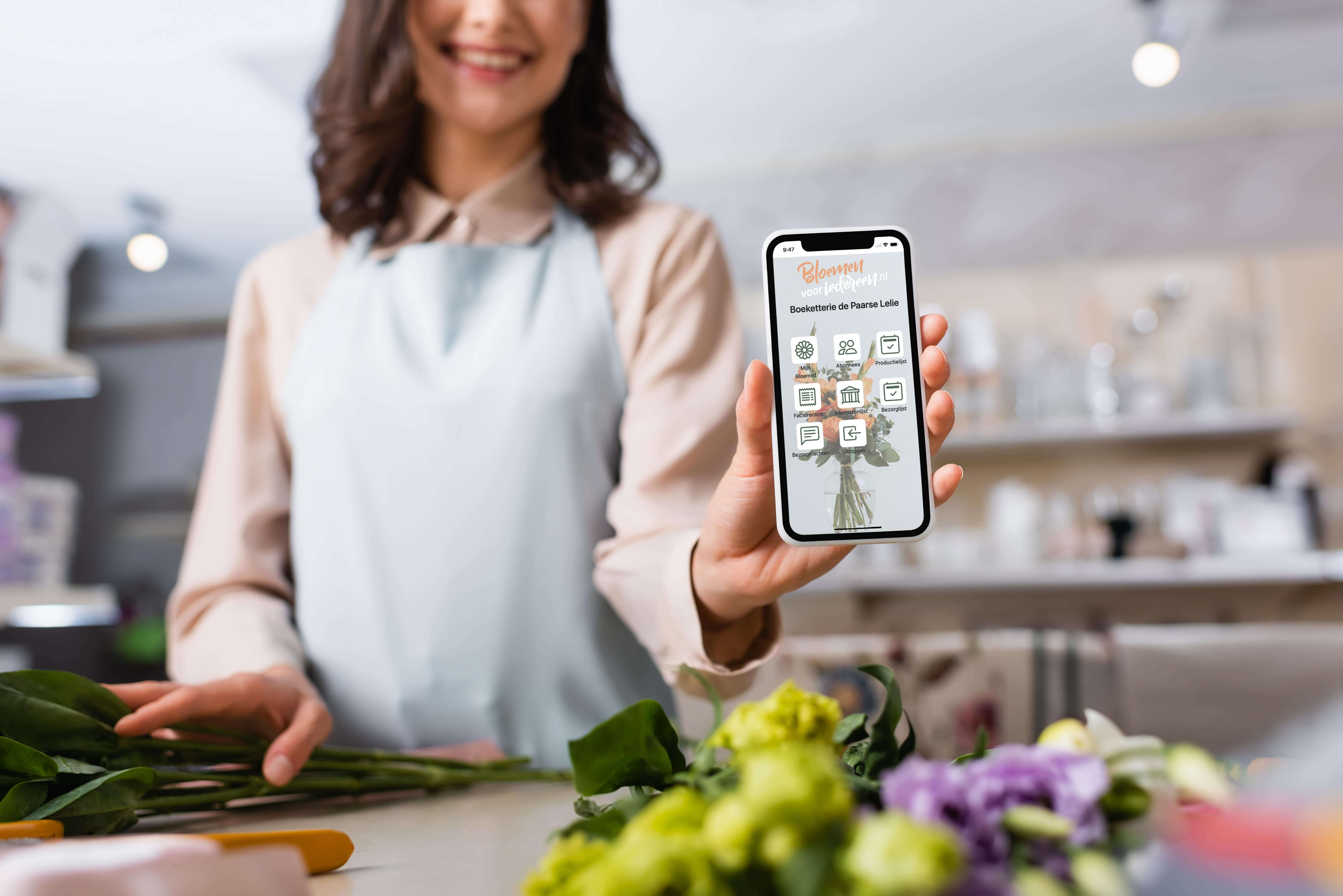 Bloemist toont een app op een smartphone